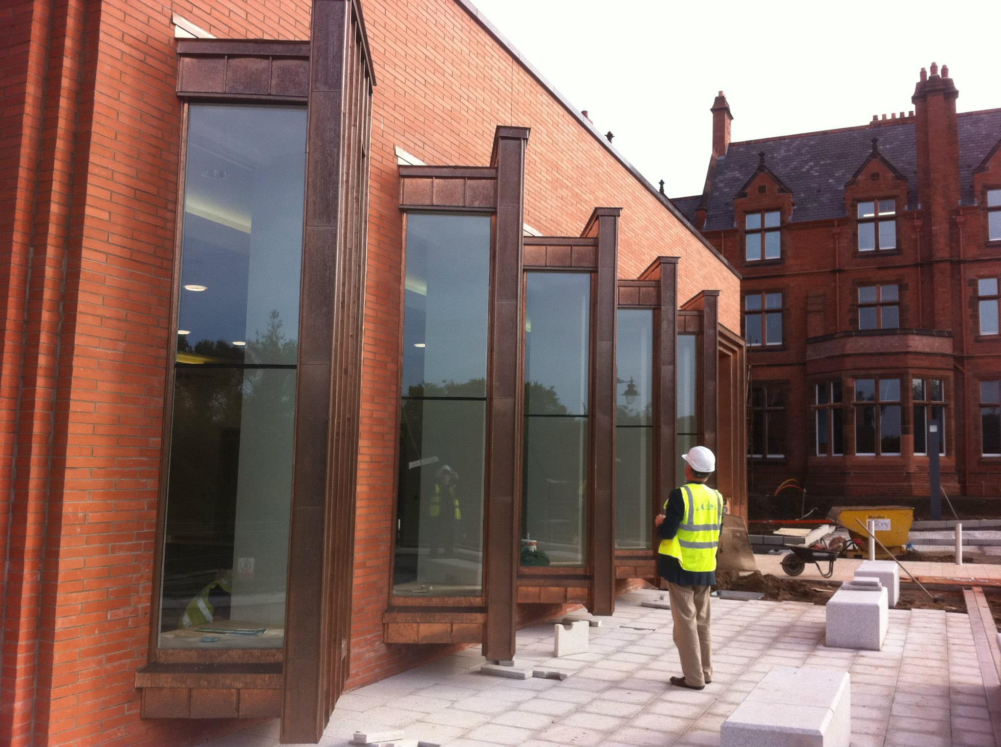 Cladding installation team at work